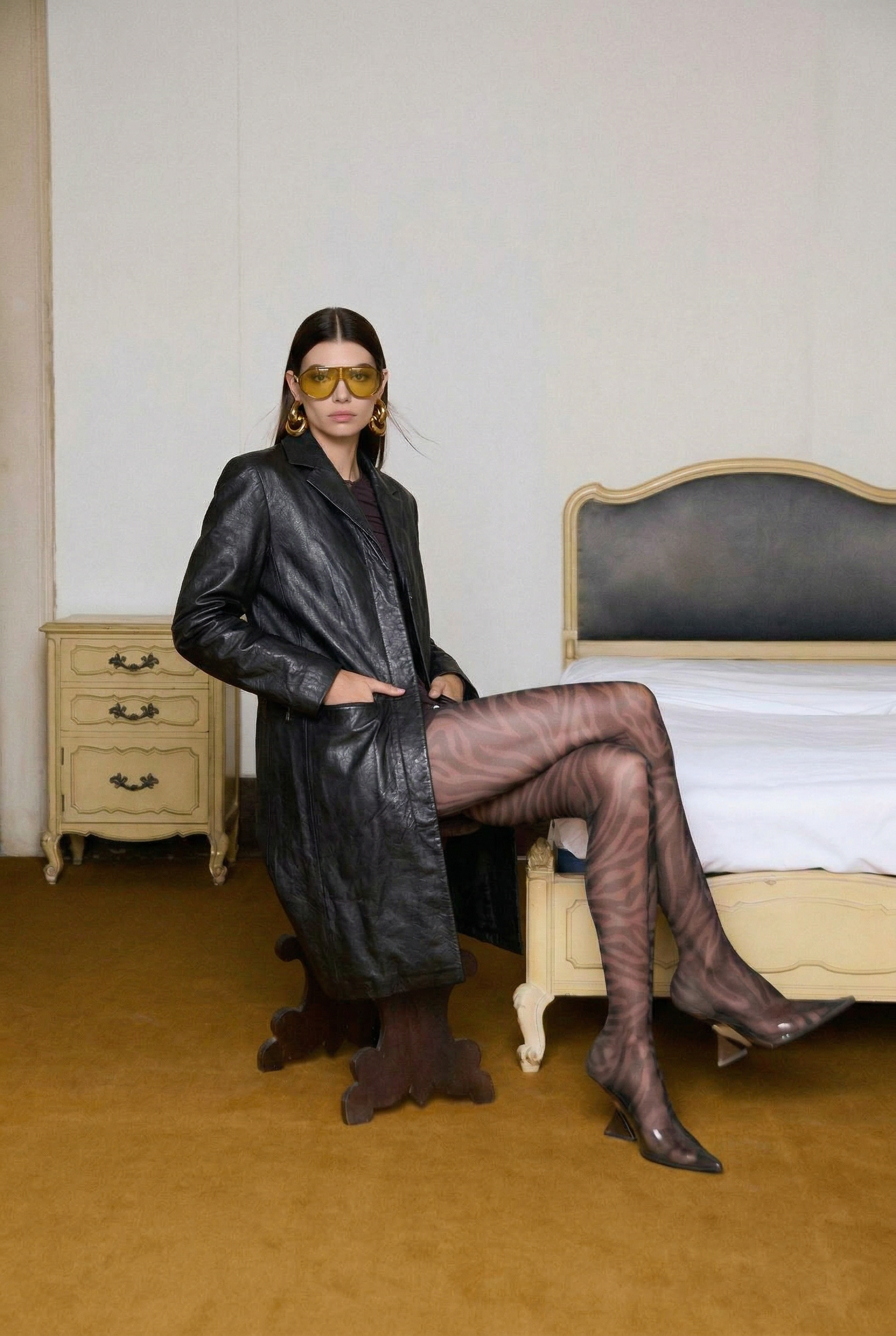 model_is_wearing_the_black_lea_Nano_Banana_2_15091.png