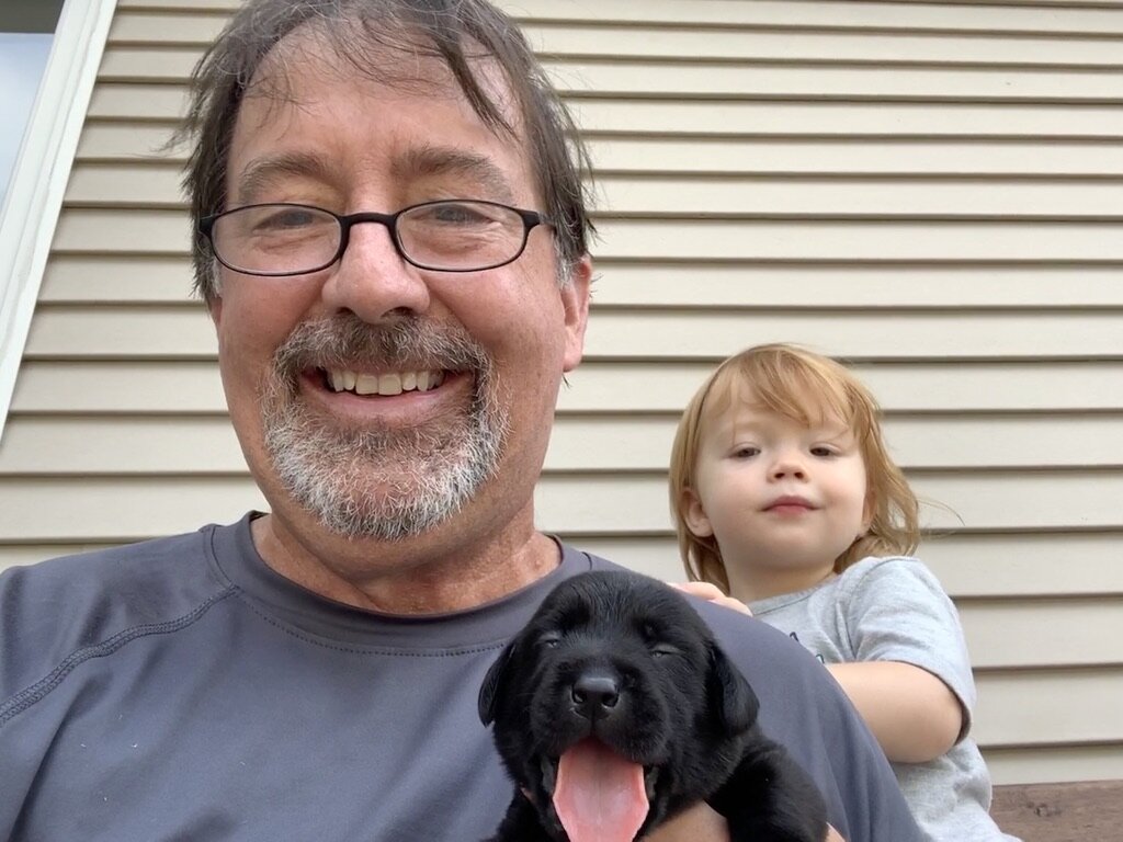 First nail trim, Maddie supervises....