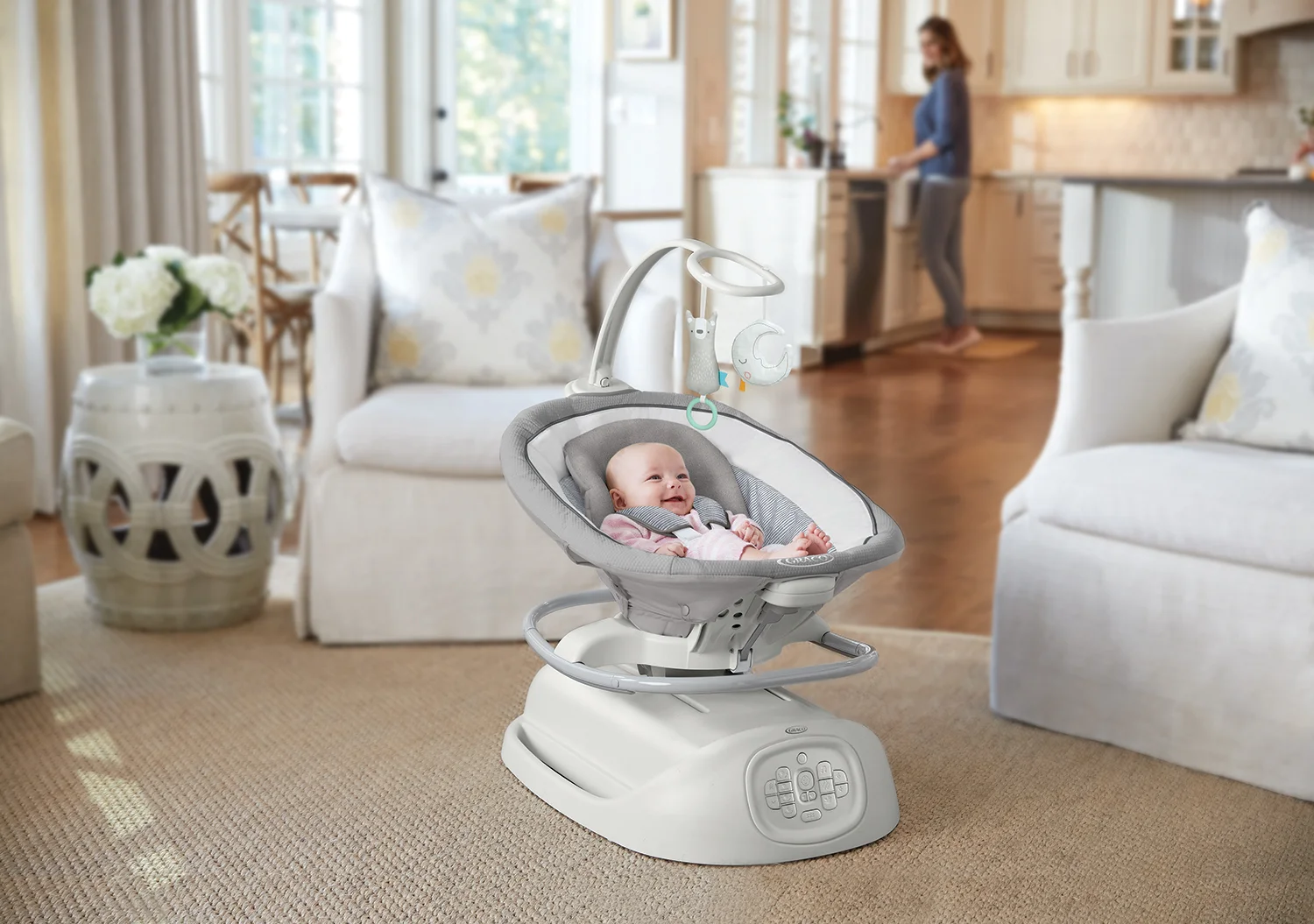 2060434-2060526-graco-sense2soothe-swing-rocker-sailor-mom-baby-in-use.jpg