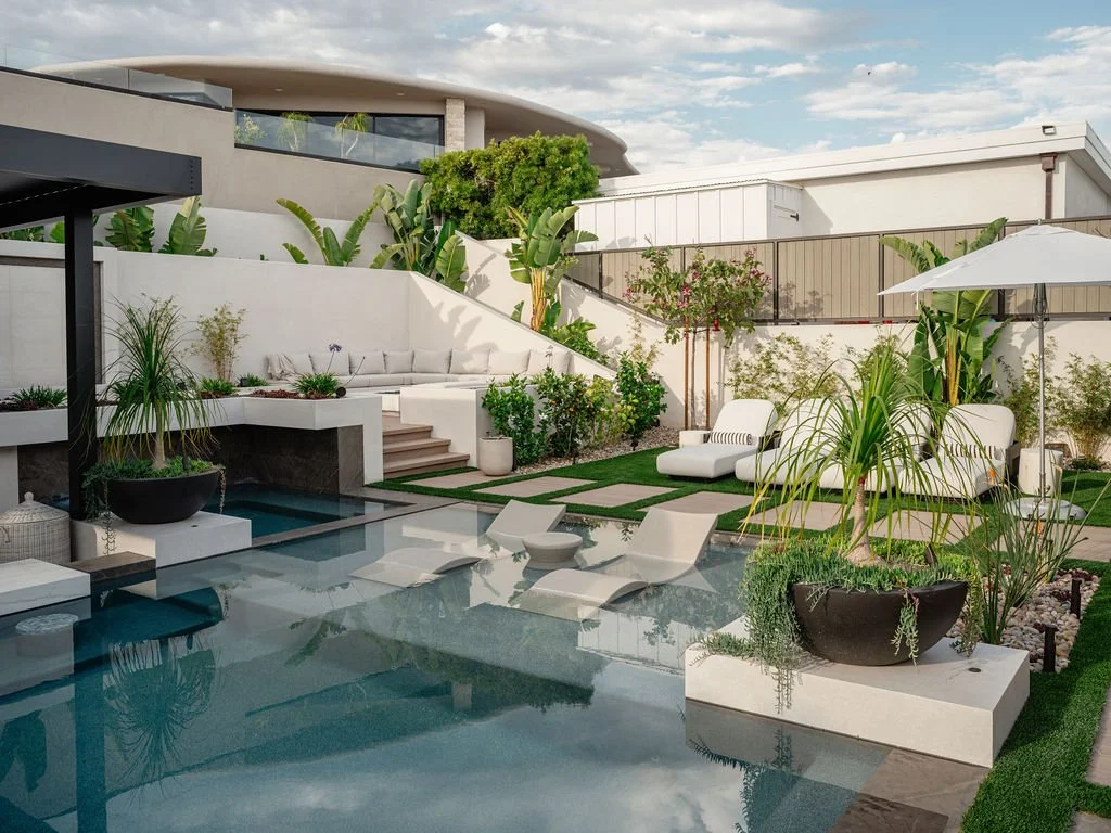 Outdoor luxurious pool with seating