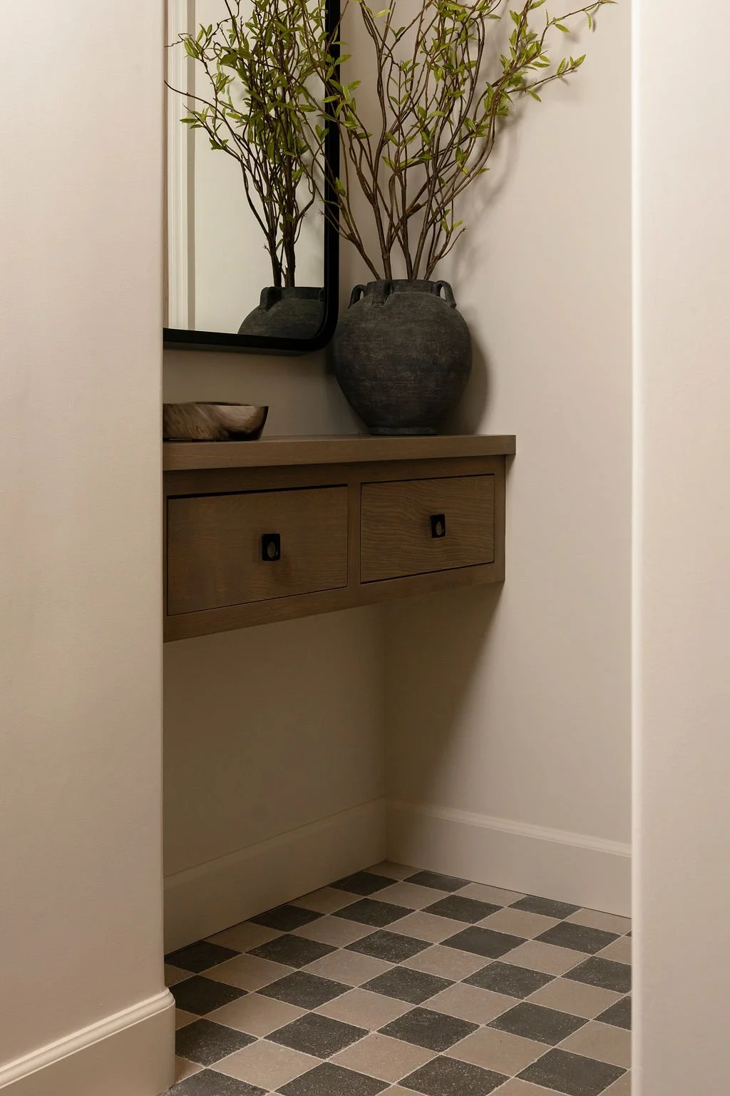 Vanity area with checkered floor