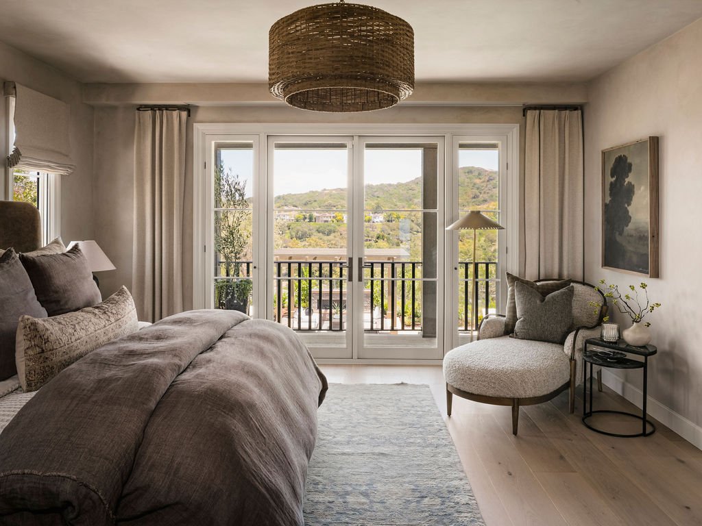 Elegant bedroom with large windows