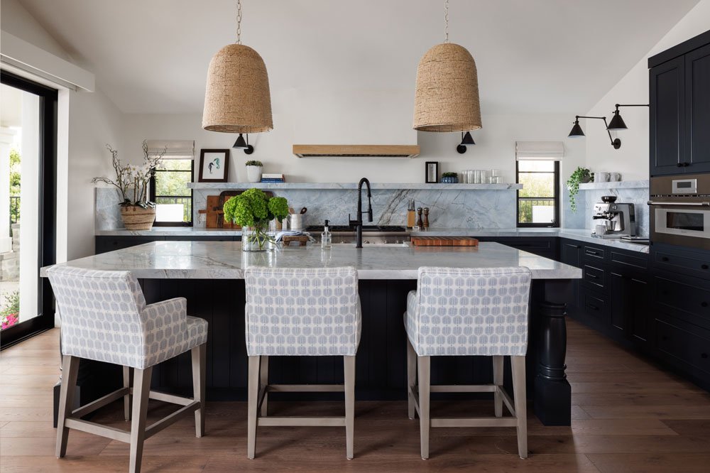 Large kitchen with warm textures and black detailing