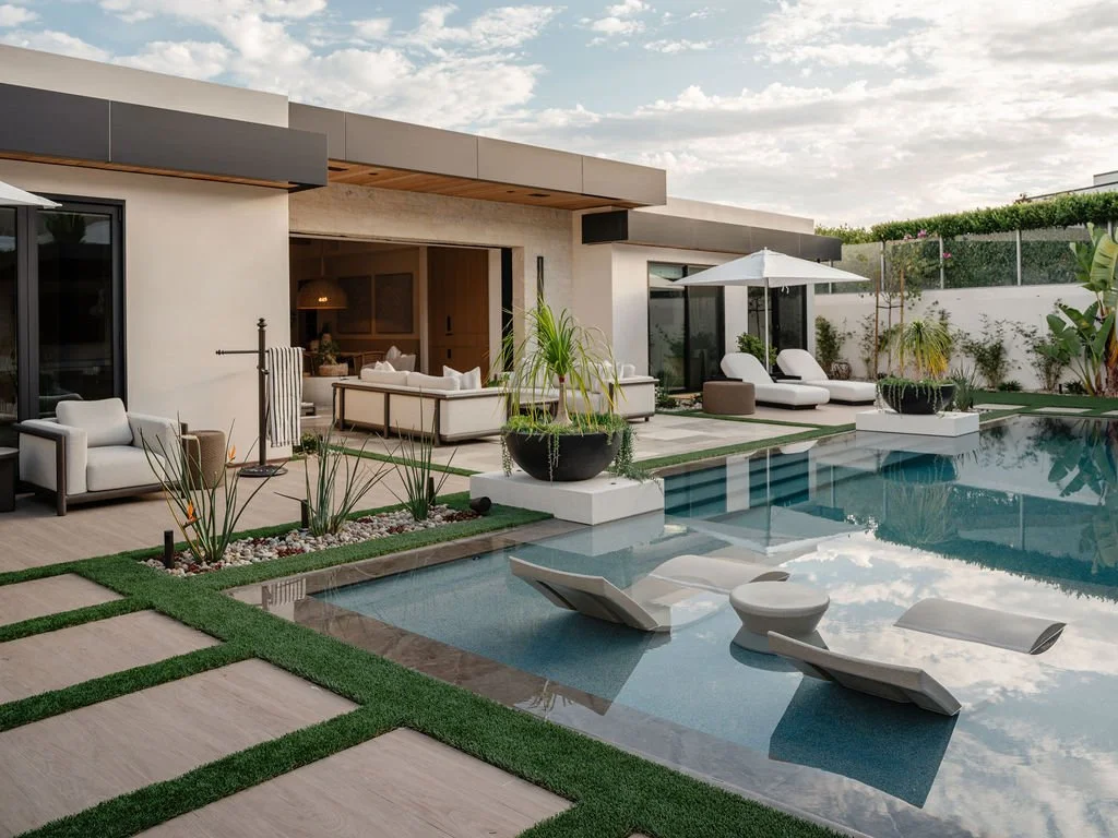 Pool with chairs in the shallow water