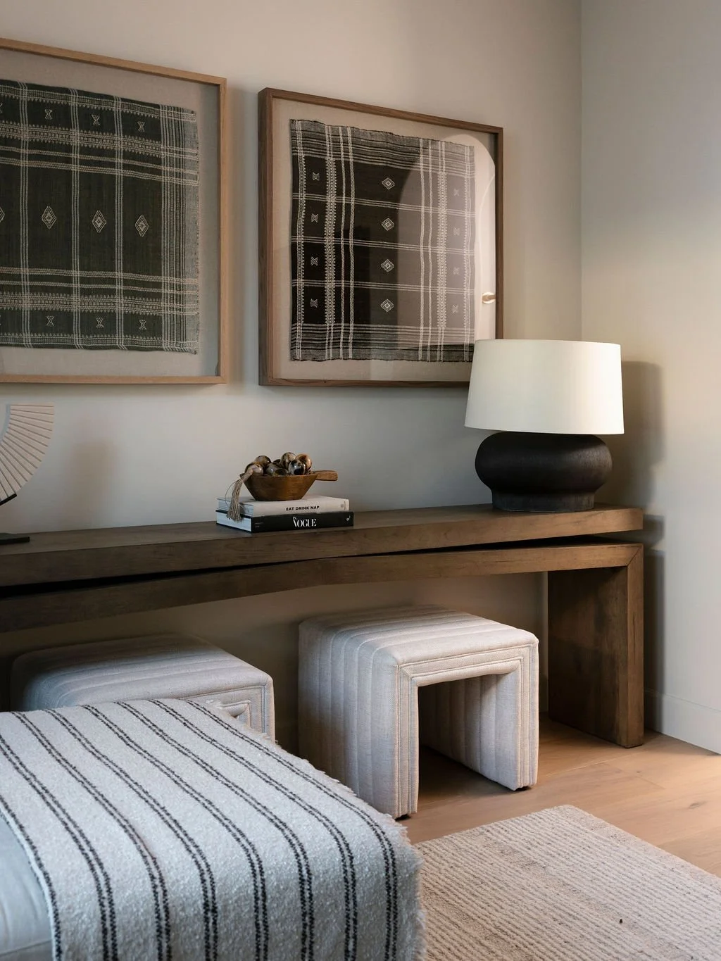 Vanity seating area with large abstract art