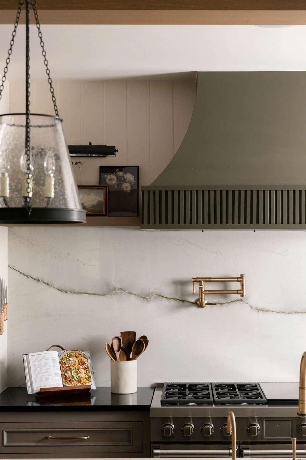 Kitchen with sage green detailing 