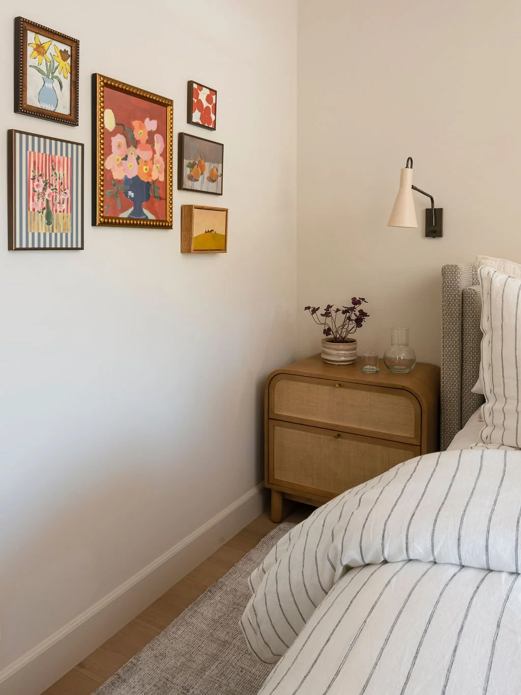Side table and artwork on the walls