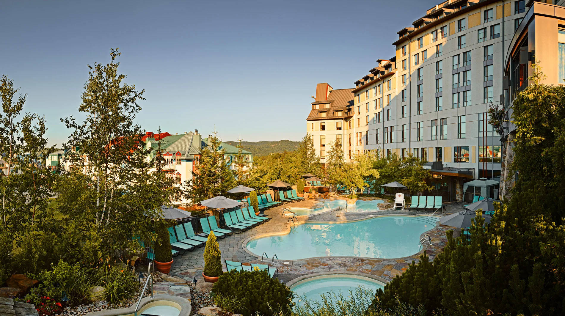 Fairmont-Tremblant-summer-pool-panoramic.jpg