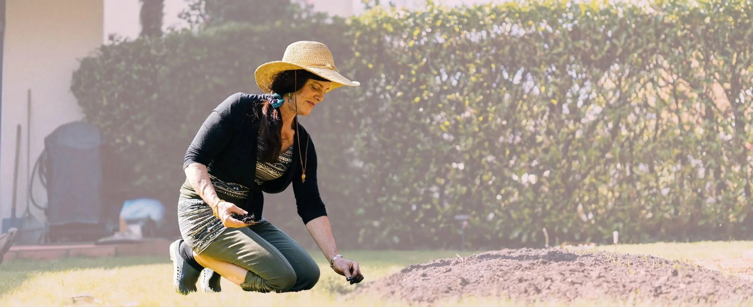 kneeling_to_sow_seeds