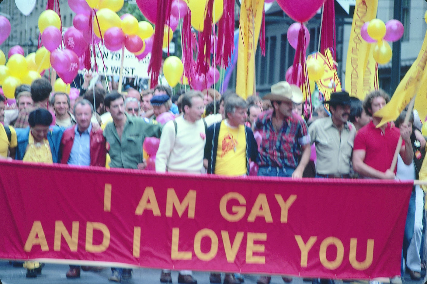  People marching with balloons and a banner that reads “I am gay and I love you,” Gay Freedom Day Parade, 1979; photograph by Crawford Barton, Crawford Barton Papers (1993-11), GLBT Historical Society. 