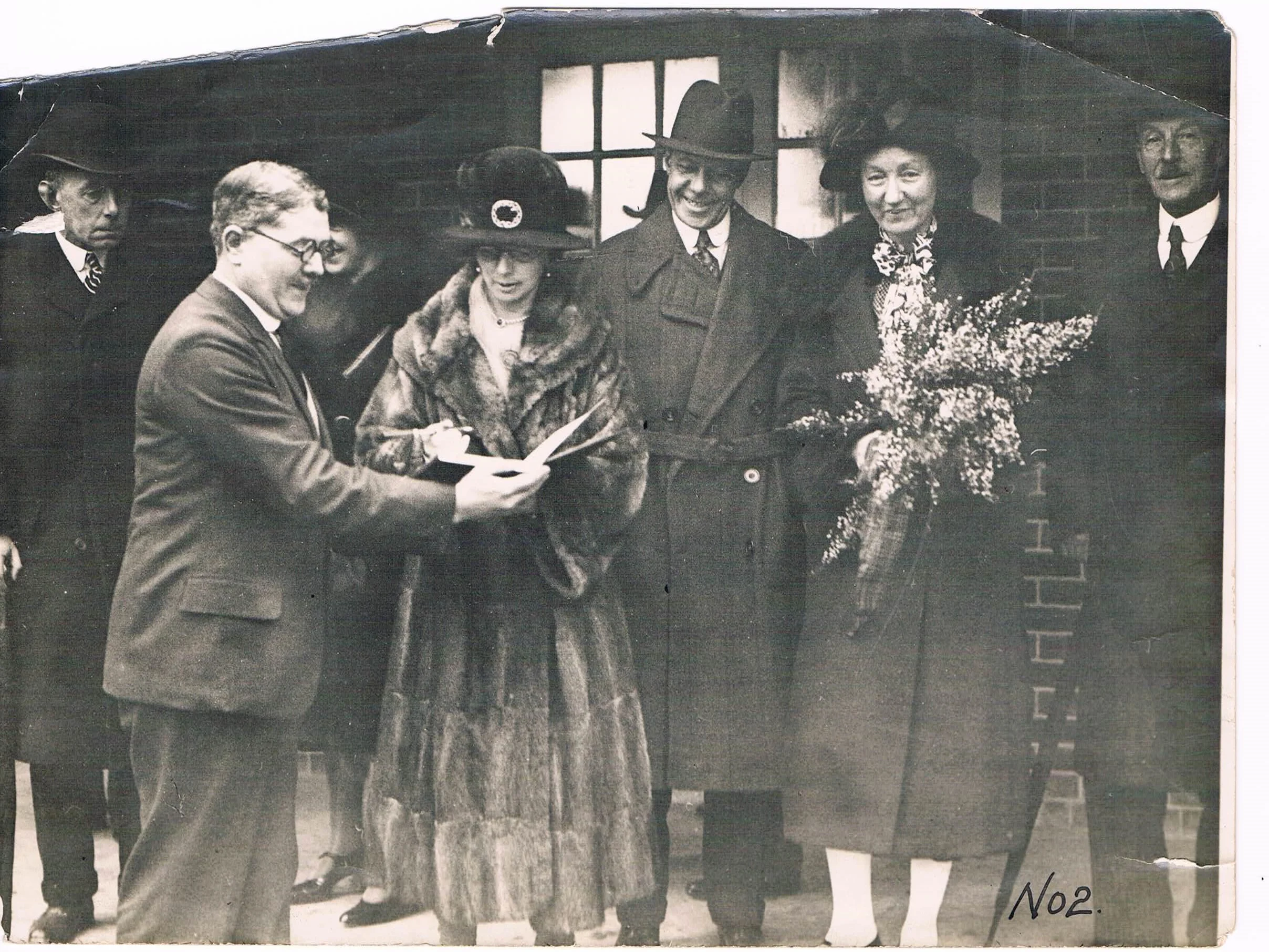 Opening of Stanmore School by Duchess of Atholl. Headmaster, G. H. Barker holding book.