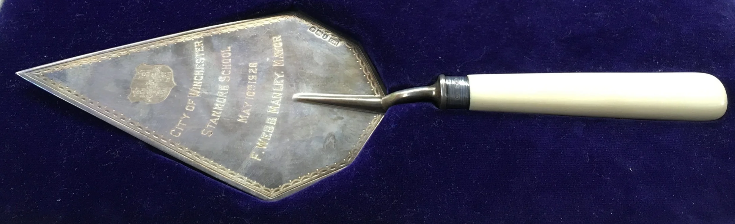 Trowel presented to the Mayor of Winchester to commemorate the Stone Laying ceremony on Stanmore School on 16th May 1928. “City of Winchester, Stanmore School, May 16th 1928, F. Webb Manley. Mayor”