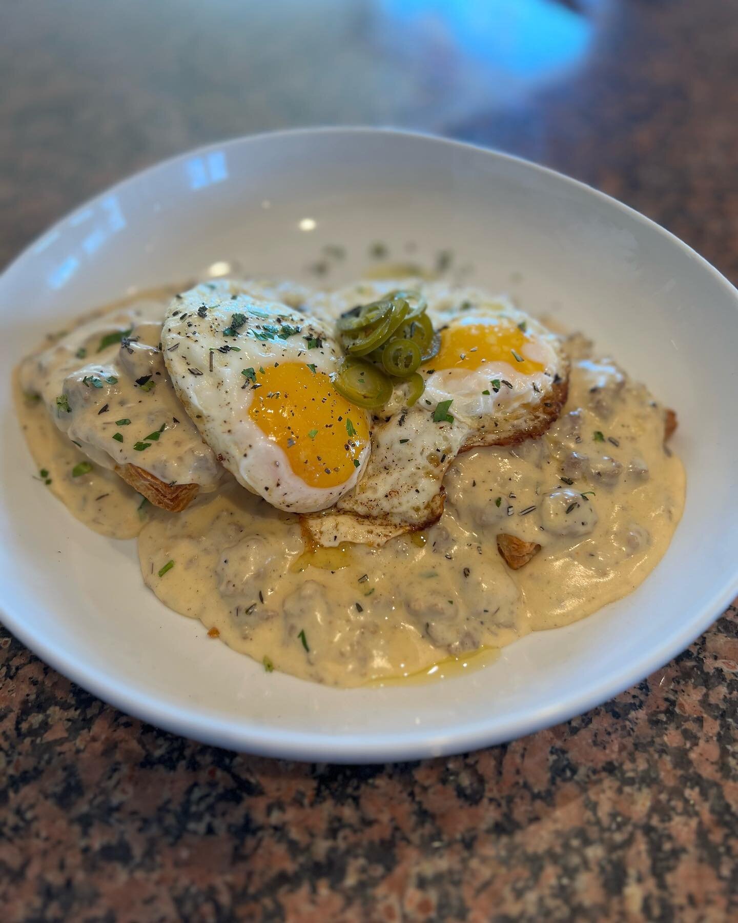 NEW MENU ITEM!

**Country Biscuits &amp; Gravy**

2 fried eggs, local pork sausage gravy, pickled garden jalape&ntilde;os