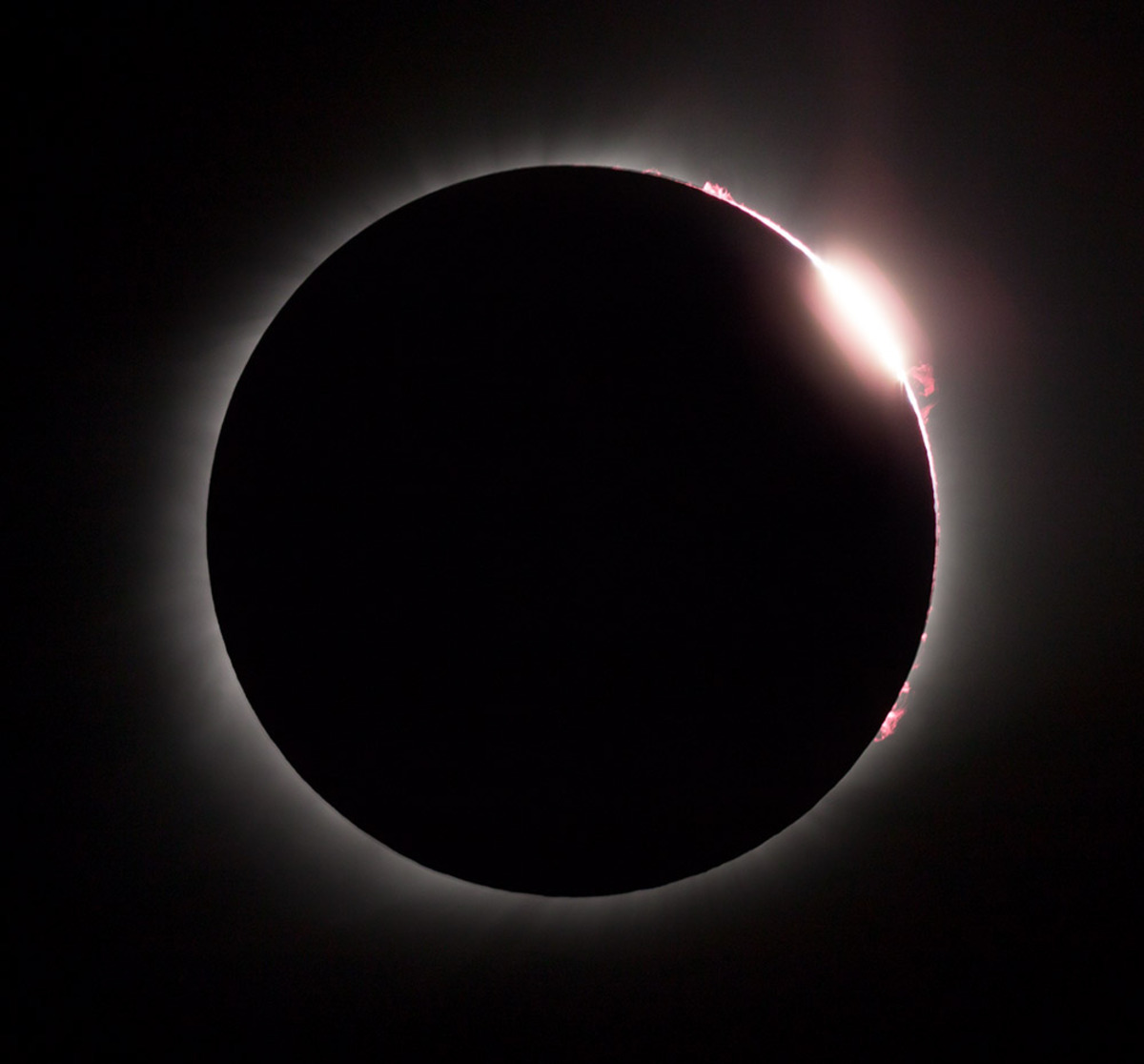 The Diamond Ring effect next to Massive Solar Prominence