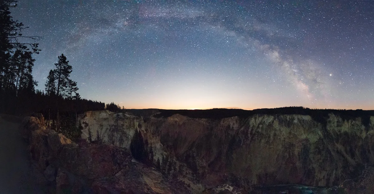 Milky Way rising before gibbous Moon over Grand Canyon of Yellowstone