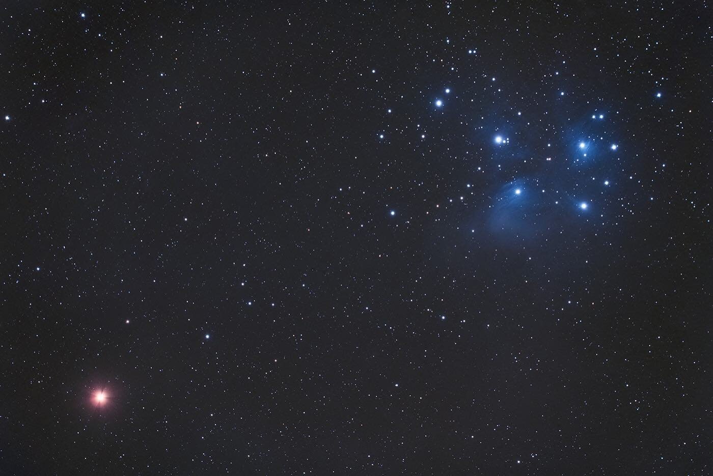 Pleiades and Mars conjunction on March 4. I hope you caught the conjunction. It was a spectacular sight in binoculars. I highlighted this and many other Astro events for 2021 on my YouTube page. #pleiades #mars #conjunction #canonphotography #canoneo