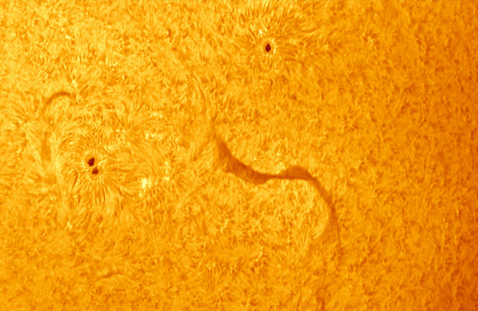 Sunspots 3023 and 3024 on May 31, 2022