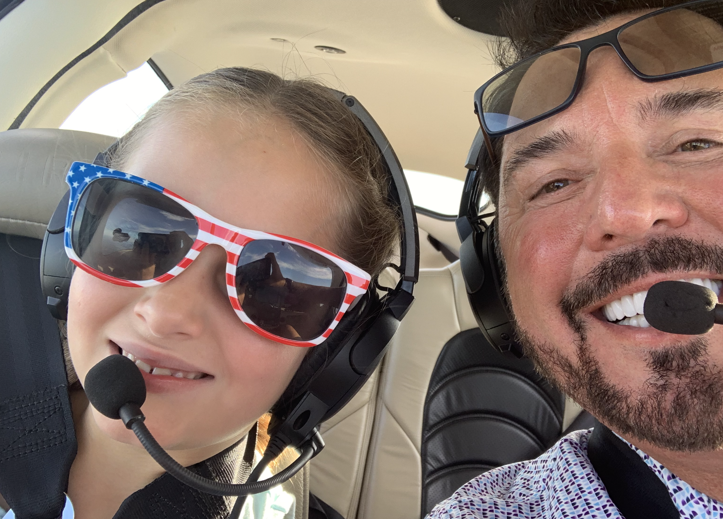 Flying the friendly skies with my granddaughter, Emma