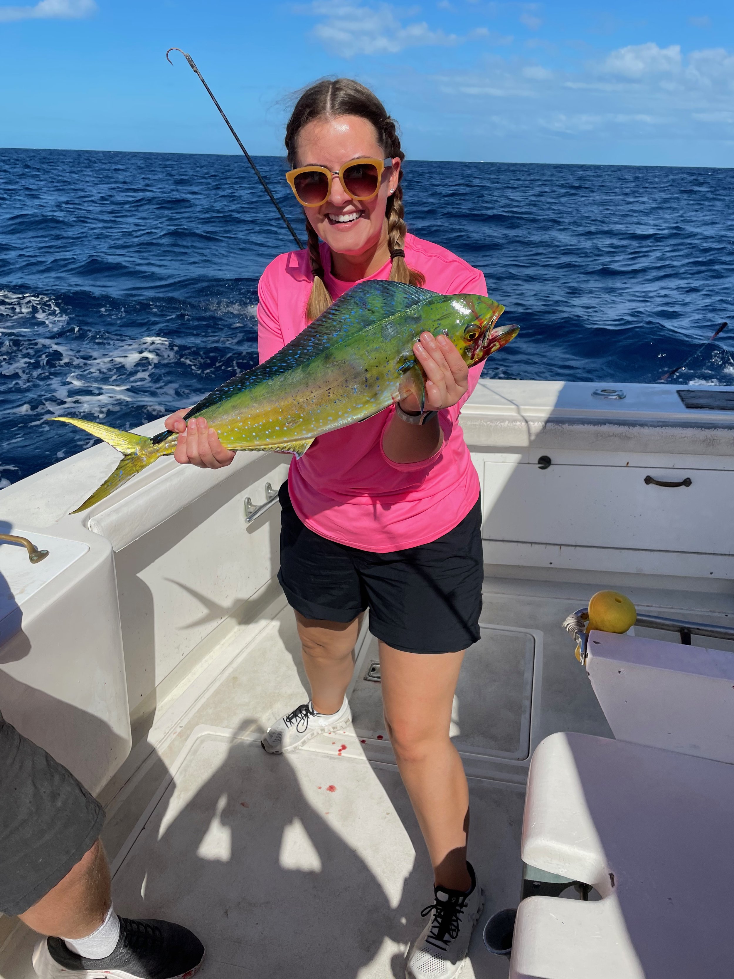 My daughter Eryn catching a big Mahi