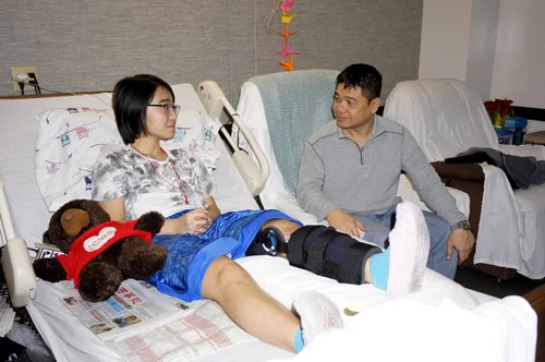 Phuong Dinh and father, Hiep Dinh (Photo by George Liu/NWAW)