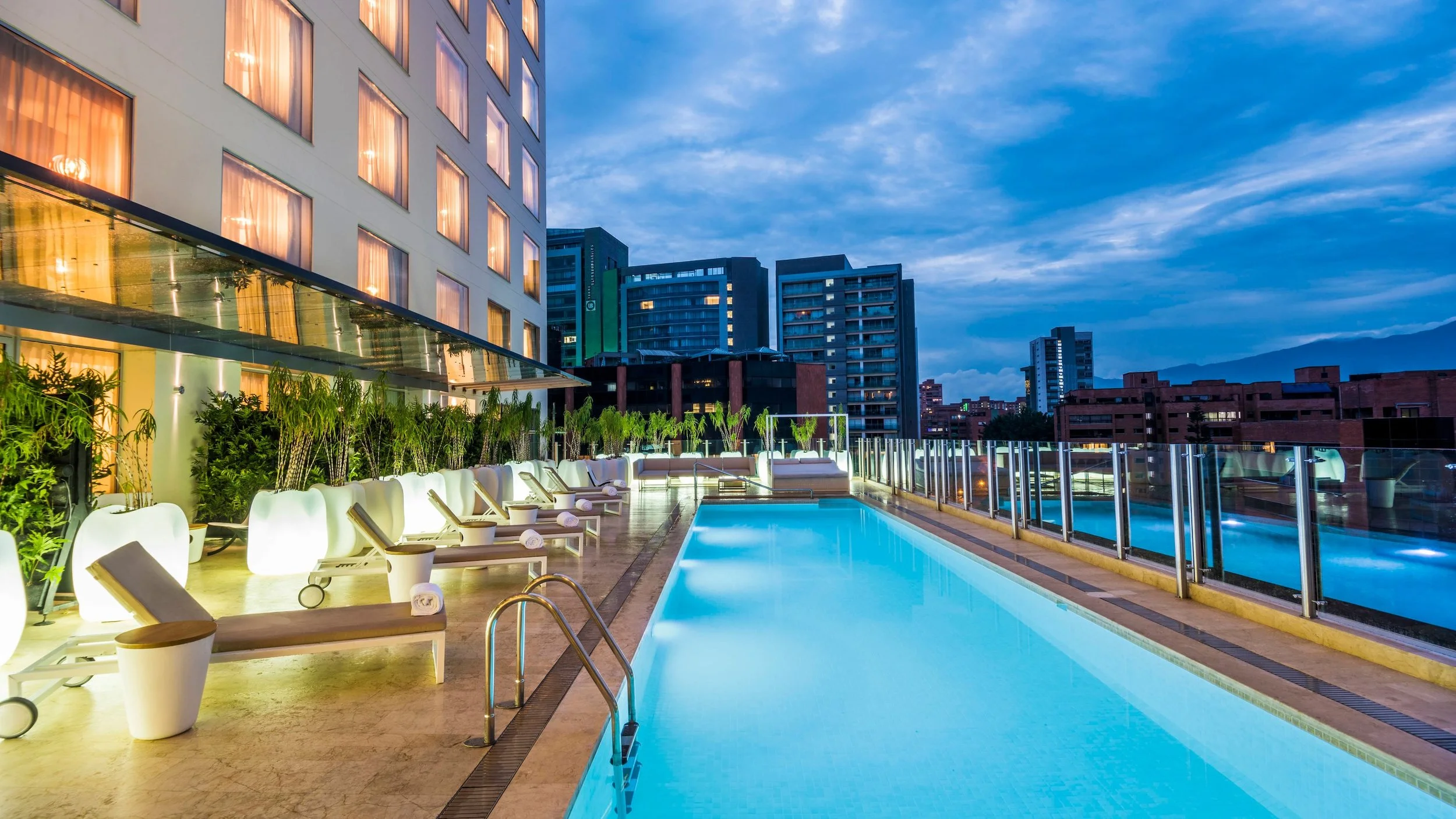 Marriot Medellín's Outdoor pool at night.