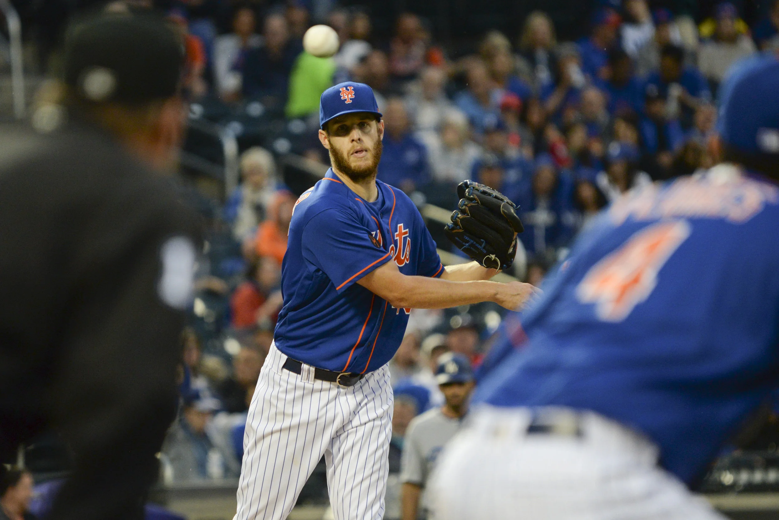  New York Mets pitcher Zach Wheeler throws the ball to first-baseman at the New York Mets vs. LA Dodgers game on Friday, June 22, 2018. 