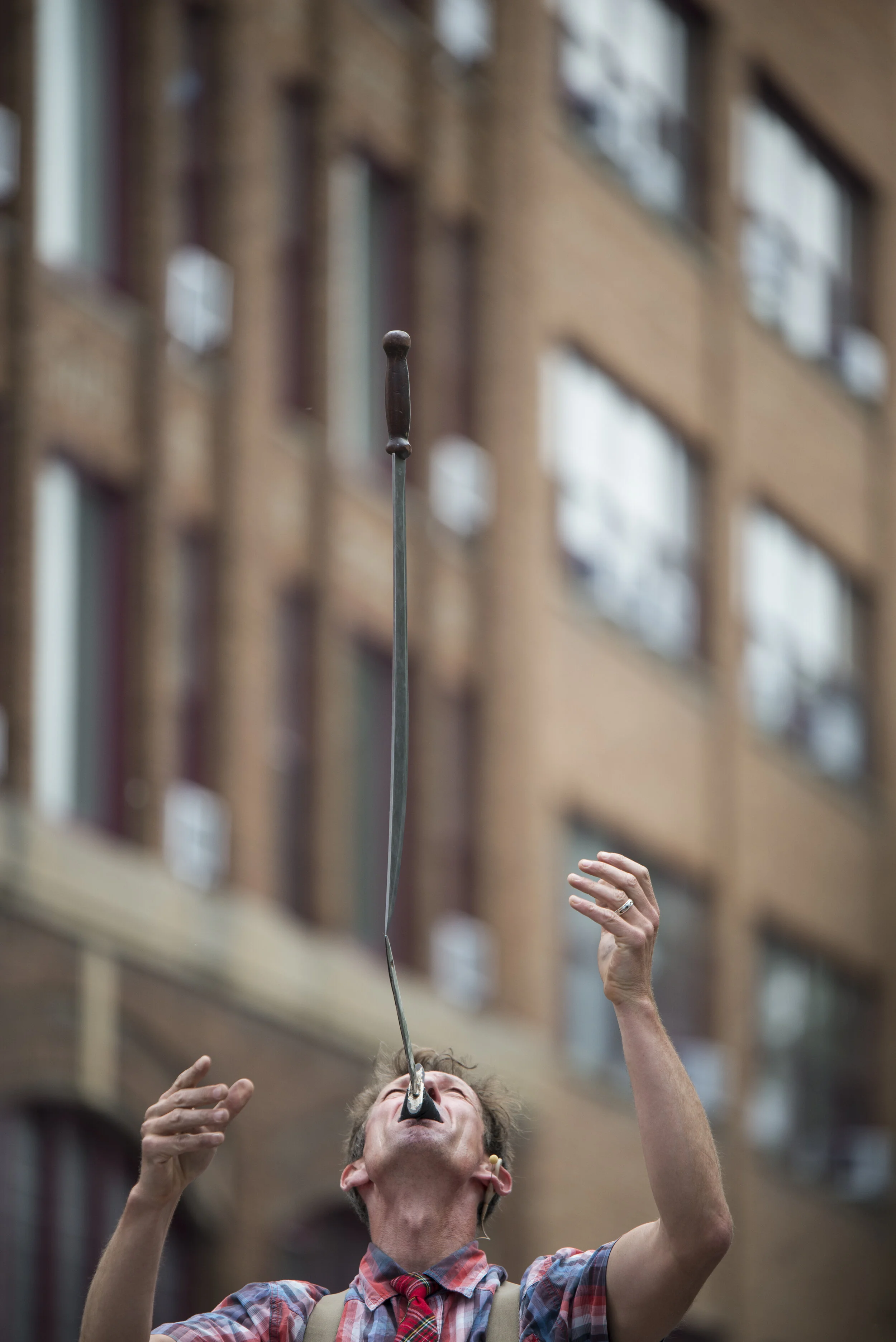  Street performer, Michael Hilbig, showcases his tricks at Ithaca Festival in Ithaca Commons on June 1, 2019. 