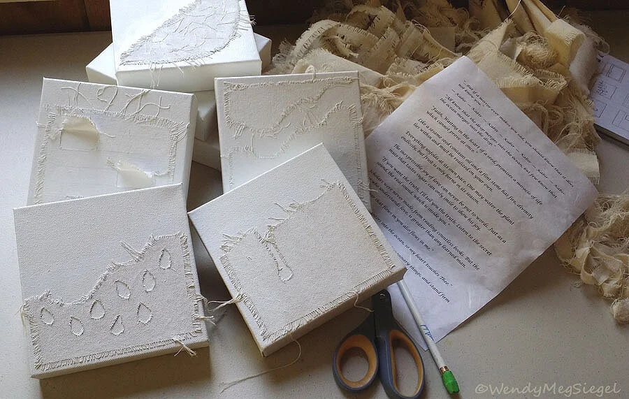 The prepared canvases before they are painted.