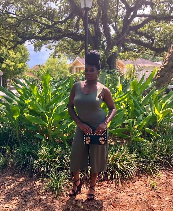 Yadie wearing the “Ariah" jumpsuit