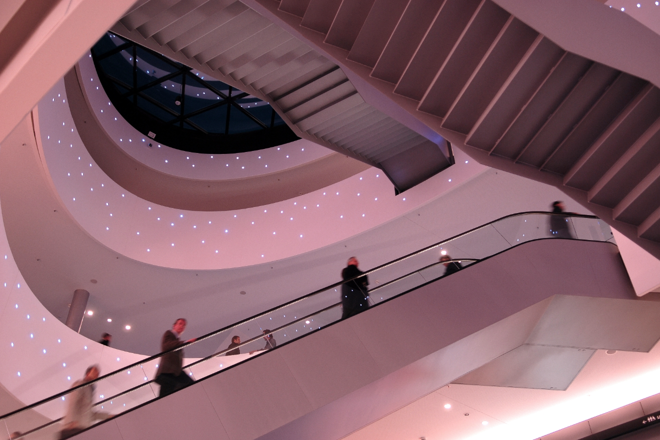 SHOPPING CENTER The shopping centre becomes a huge, subtle multi-dimensional sound sculpture . The visitors experience an unprecedented and fascinating spatial atmosphere. The emotional and inspiring sound scenery takes effect as psychological priming for the products in the different shops.