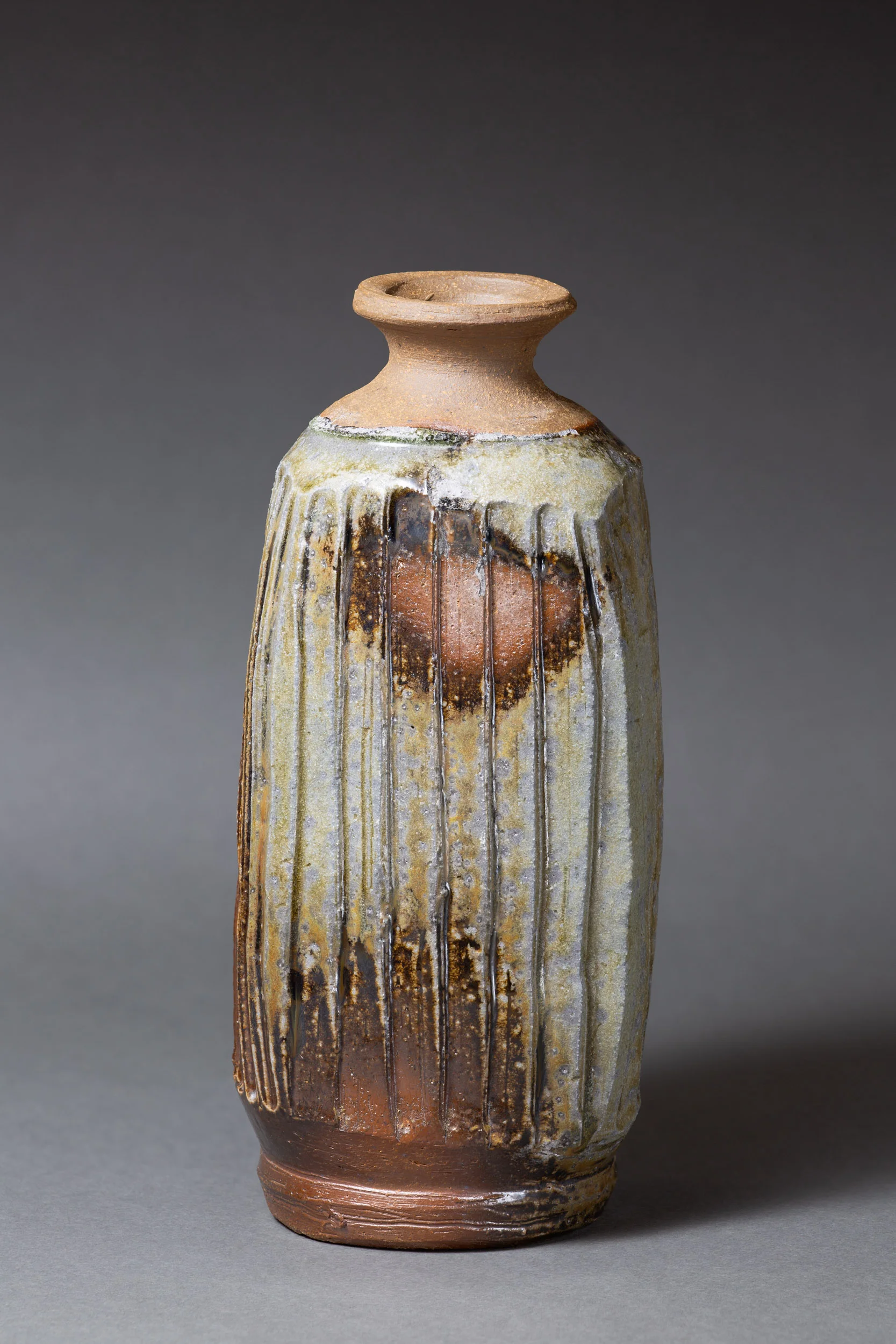   Square bottle with carved lines   3” x 3” x 8”  ID: 6004  SOLD 