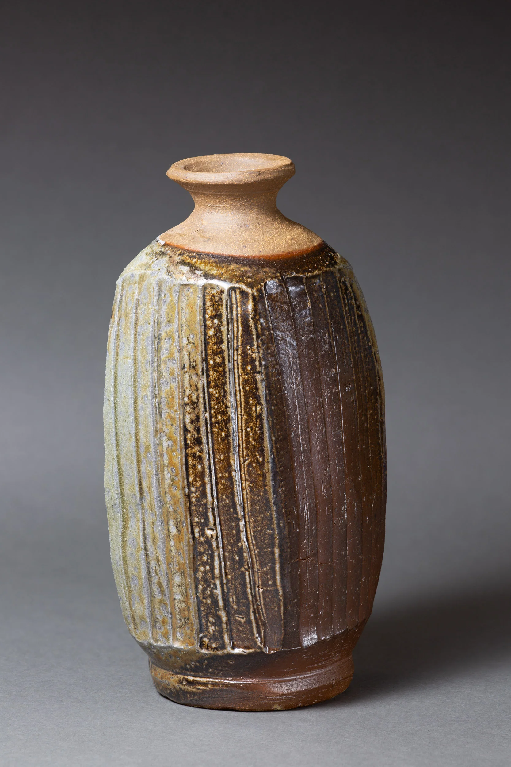   Square bottle with carved lines   3” x 3” x 8”  ID: 6004  SOLD 