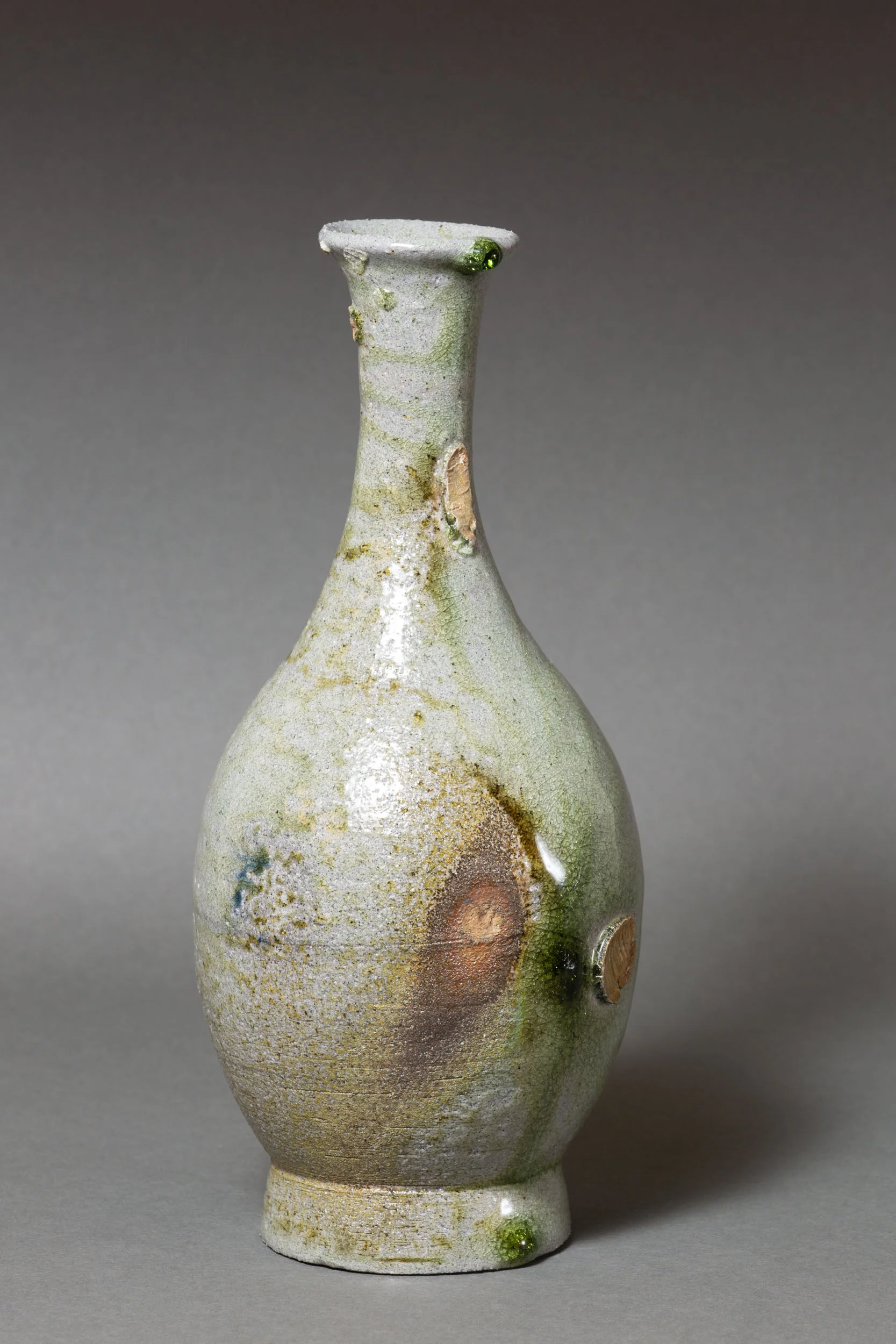   Bottle with green drip, long neck   4.5” d, 10" h  ID: 6019 