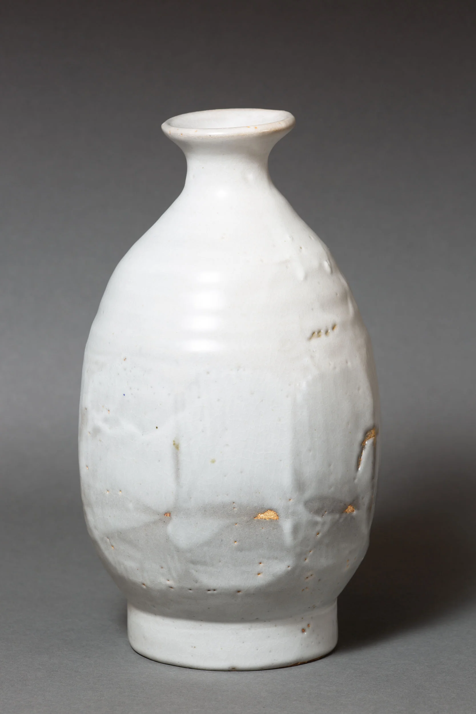   Octagonal bottle, gas fired   5.25” d, 9" h  ID: 6021 
