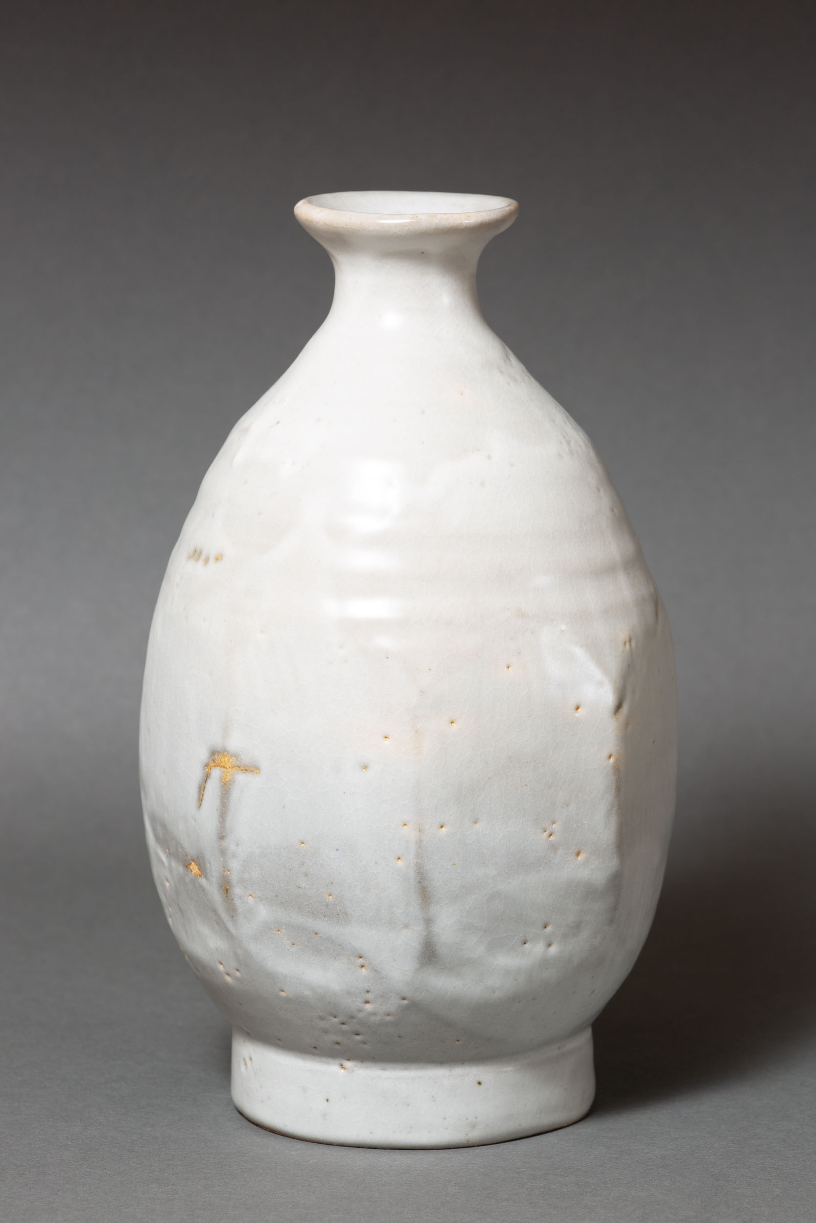   Octagonal bottle, gas fired   5.25” d, 9" h  ID: 6021   