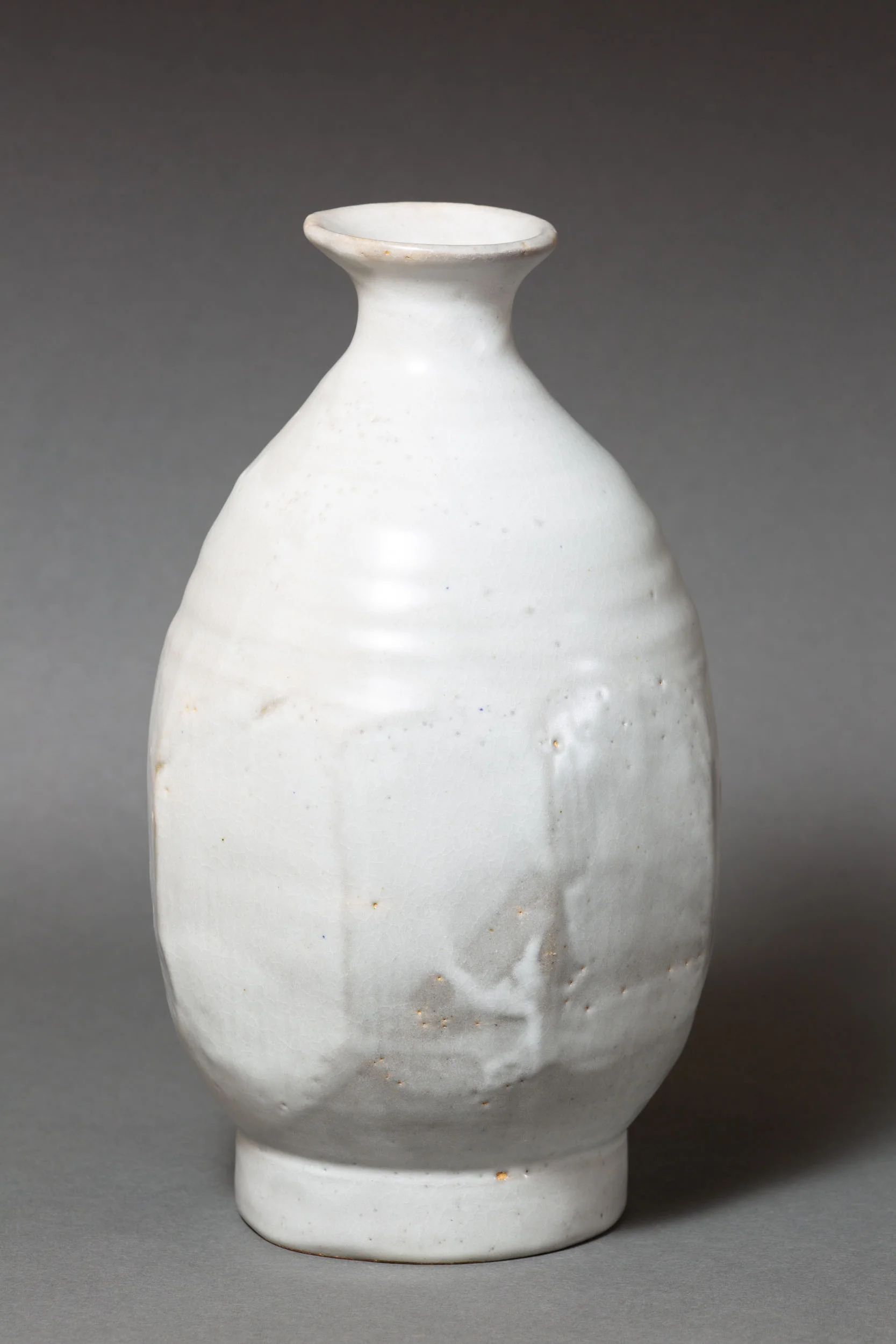   Octagonal bottle, gas fired   5.25” d, 9" h  ID: 6021   