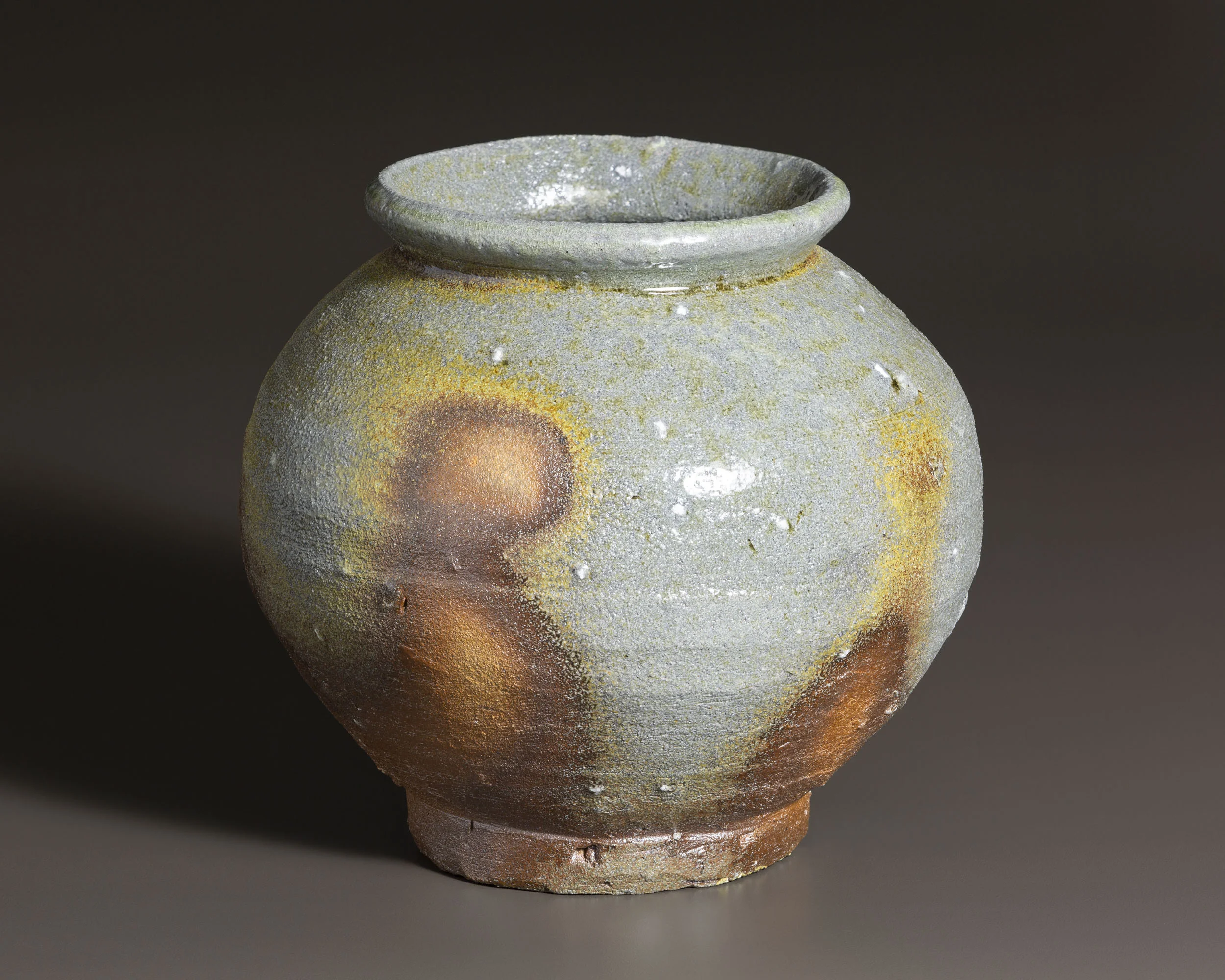   Mini tsubo shaped vase with silica stones   7” d, 6.4” h  ID: 5011 