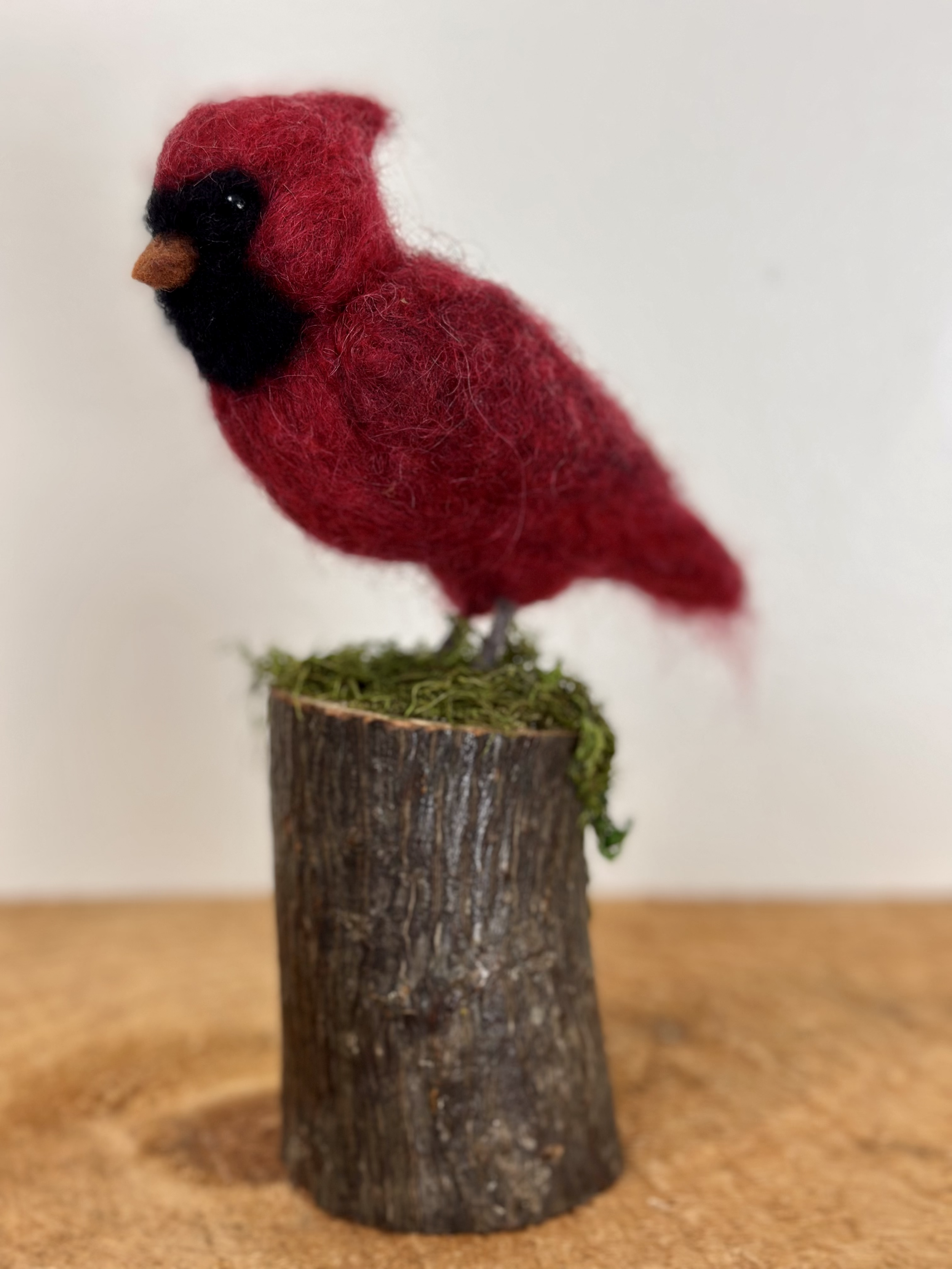 Handmade Male Cardinal, perched on a moss covered branch. 