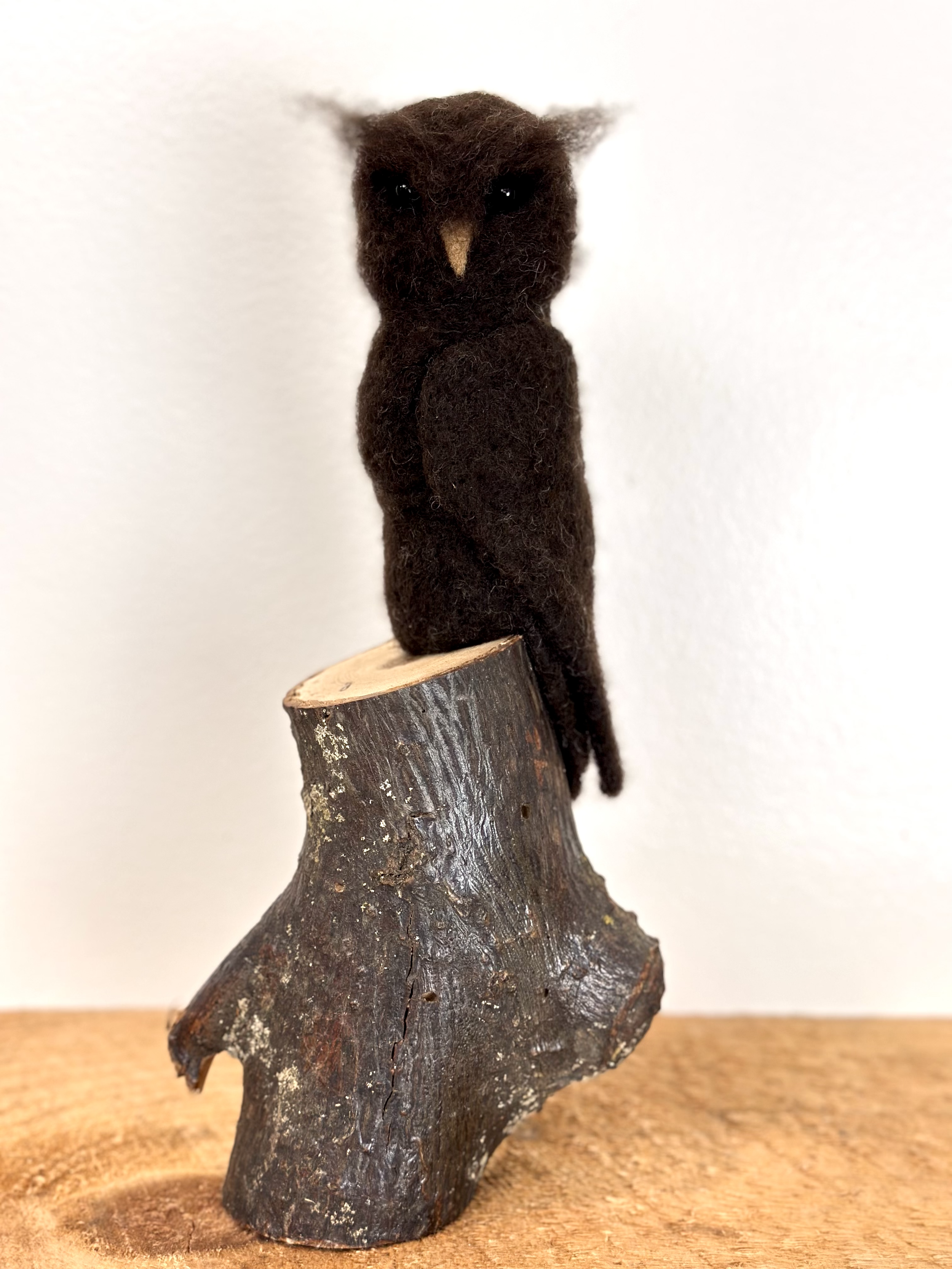 Refined and wise, Great Horned Owl, perched on a branch, handmade with Merino Wool.
