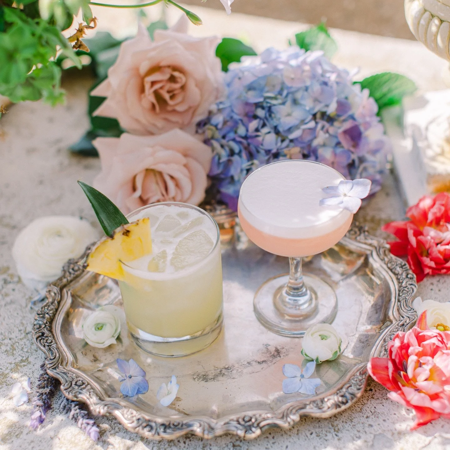 From &ldquo;yes&rdquo; to &ldquo;I do&rdquo; and every toast in between. 🥂❤️ Wishing you a Valentine&rsquo;s Day filled with love, joy, and a celebratory cocktail (or two!).
.
.
Photo by @xoandfetti 
Flower by @irisesdesignsca 
Cocktail by @la.speak