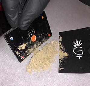 Collecting dry sift resin with a card.