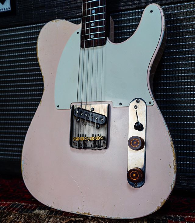 Shell pink Nichols guitar with Rosewood Musikraft neck.  The Lindy Fralin Split Steel Coil pickup gives it a bit of a p90 tone.  Mastery bridge and Rock Rabbit slant-switch control plate.