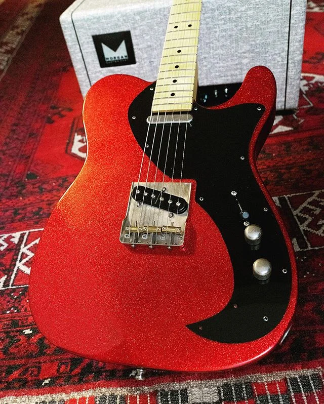 I&rsquo;m finally back from fishing and building guitars again!  First up is this very custom Nichols red sparkle guitar. Many unique features such as contoured neck and cutout neckplate.  This one is going to Singapore. Seymour Duncan vintage stack 