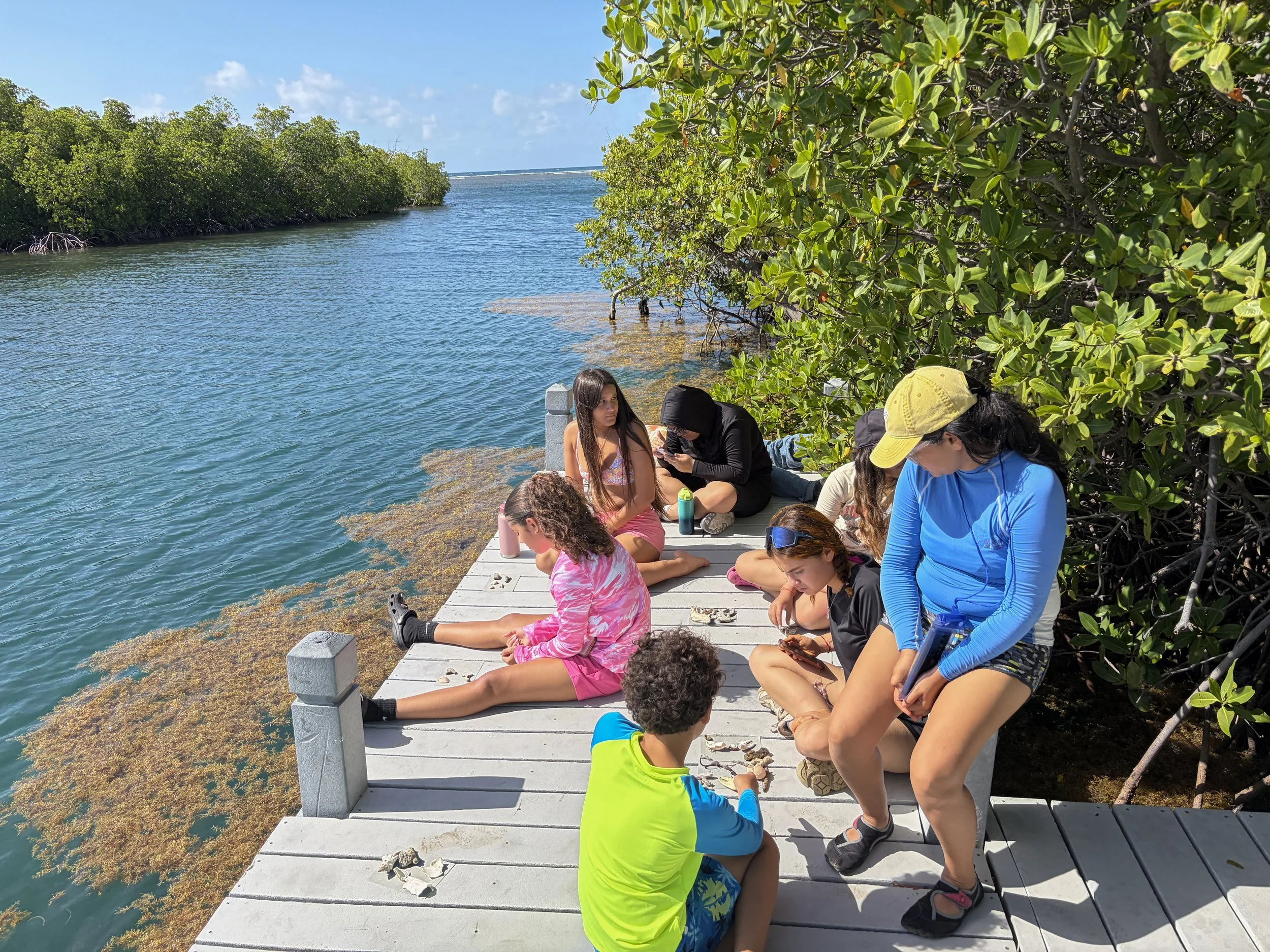  Campers gather at the docks to make the cyanotypes before they take a swim 