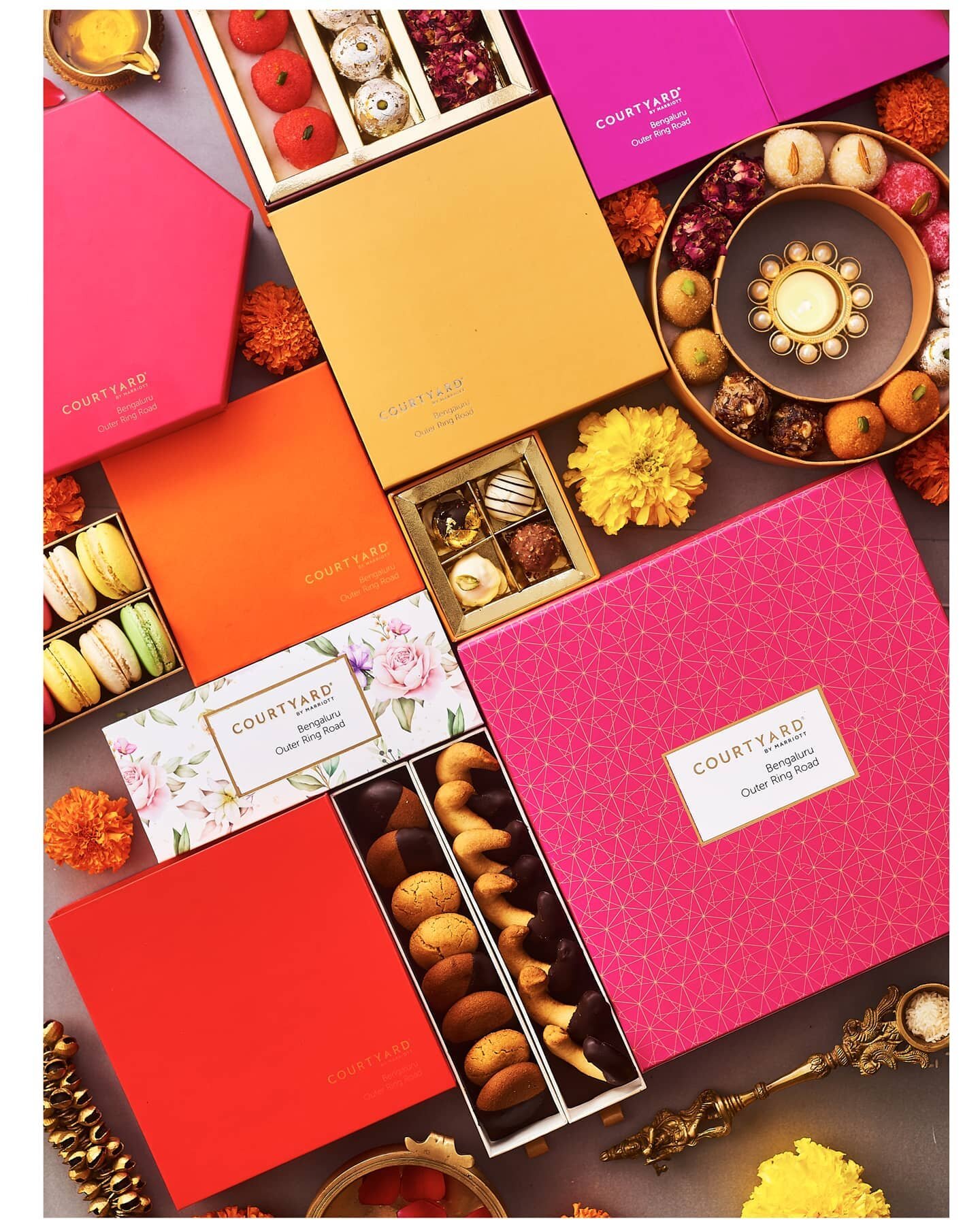 Its almost Diwali time (or maybe time to start prepping for it!) We had recieved an email from Courtyard by Marriot just a week ago to plan and shoot a diwali range of boxes, chocolates and sweets. In the past few days, we've created a moodboard, con