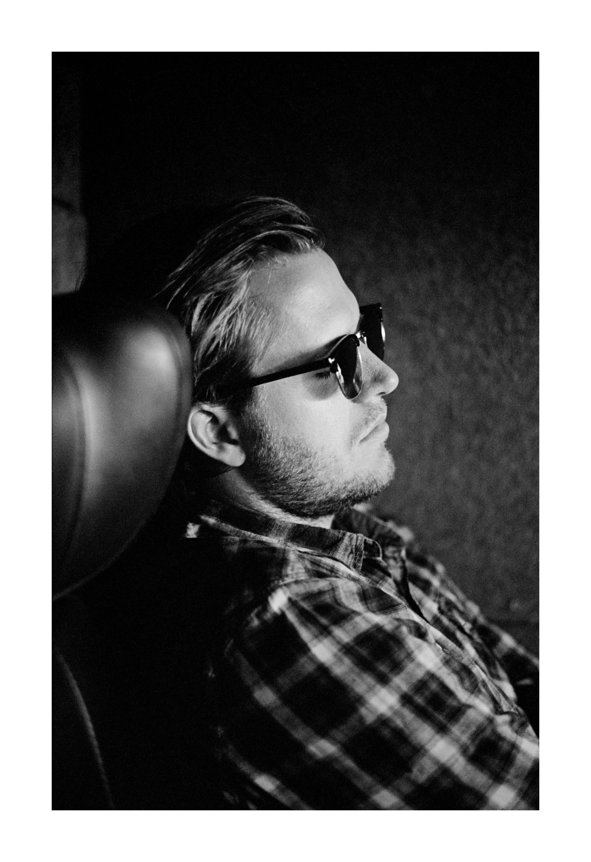 Killian in the tour van, somewhere in Europe, 2012.