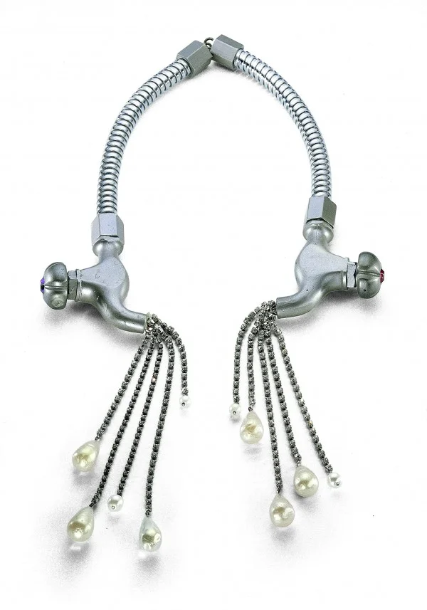 "Shower parts used as a necklace. Karl Lagerfeld for Chloe, 1983" Image Source: Marlm.com