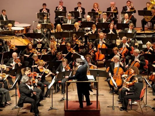 Delaware Symphony Orchestra being directed by David Amado in recent years.