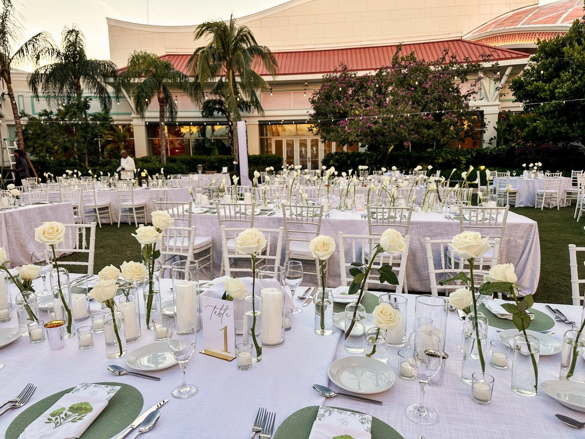 The night before the vows was quiet, intentional, and full of heart.
Tables set on the lawn, beneath a canopy of stars ✨
A certain stillness in the warm Bahamian night 🌙
White roses. Candlelight. A setting that invited presence &mdash; and the feeli