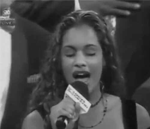 Mika Hale singing the National Anthem at the Mike Tyson and Evander Holyfield fight in 1997. (Image: Mika Hale)